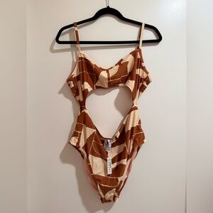 Madewell One-piece swim suit with cut out. Brand NEW. Never been worn. Size XXL